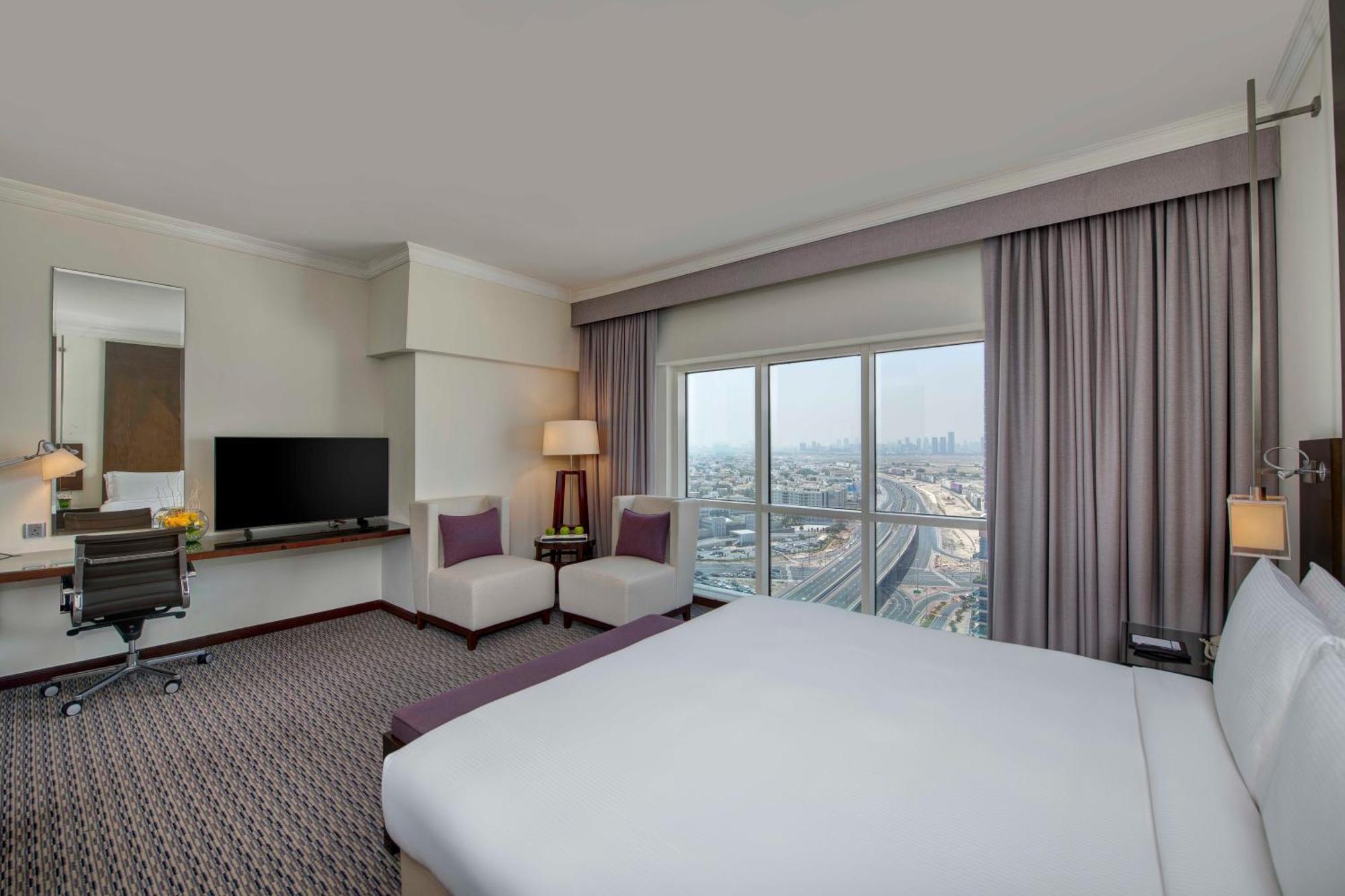 Hotel Media Rotana Dubái Exterior foto A bedroom at the hotel